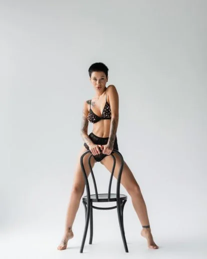 woman posing sensually in lingerie