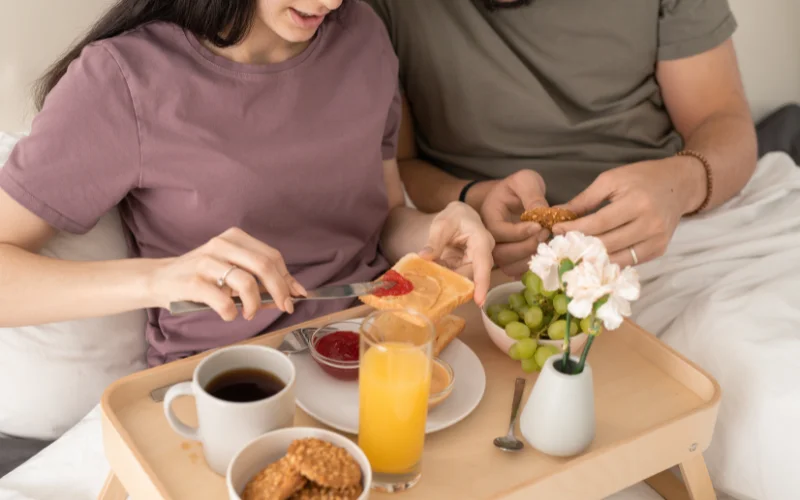 instagram bedroom photoshoot ideas, bedroom photoshoot poses while having breakfast in bed