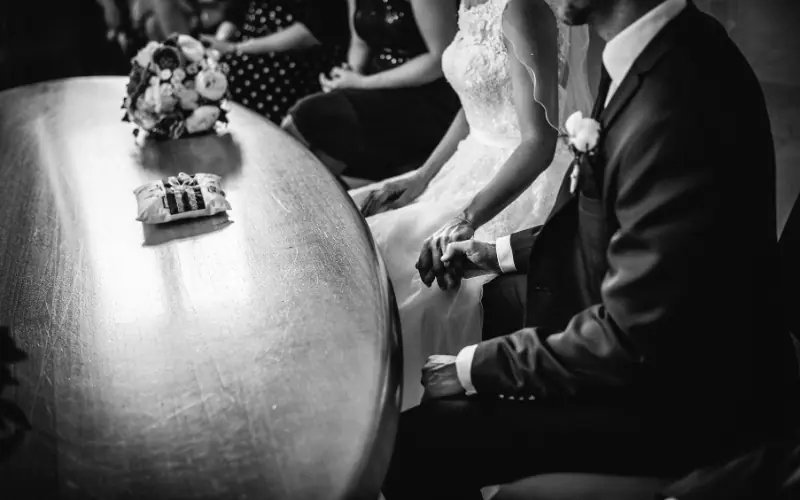 couple having a bouquet in their hands