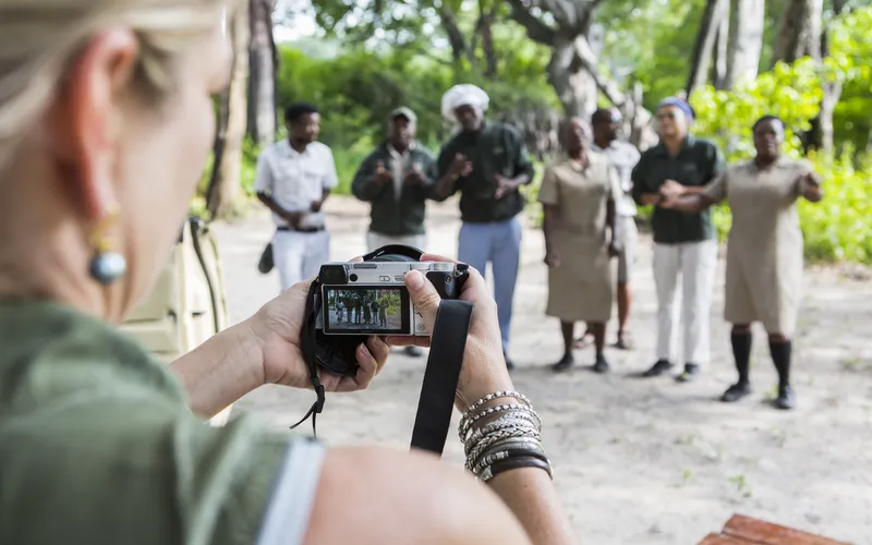 photographer clicking photos of local people
