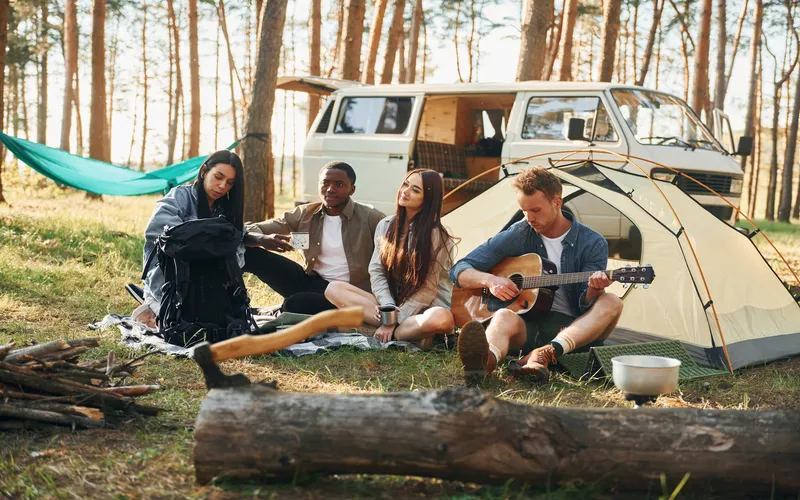 group of people camping and travelling