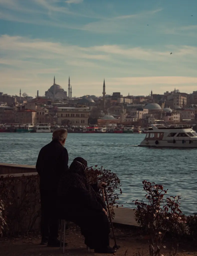 Old couple posing looking at a distnce
