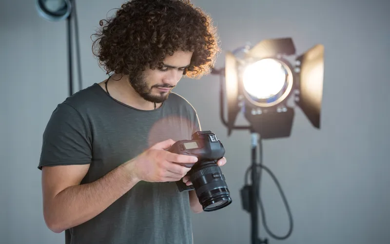 photographer reviewing White light balance in photos