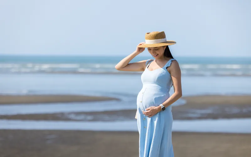maternity shoot on the beach