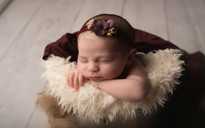 newborn baby in the froggy pose