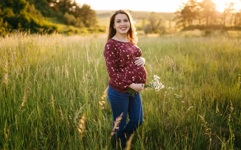 pregnant women's photo taken from side angle