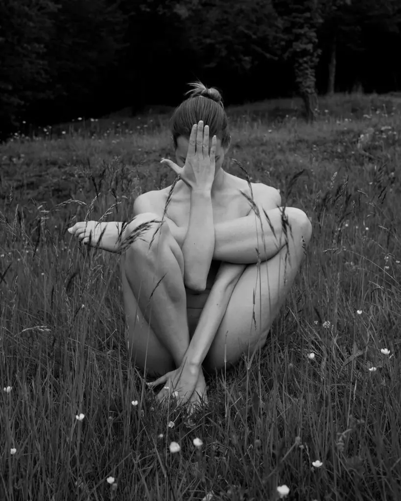 black and white nude photo of a woman