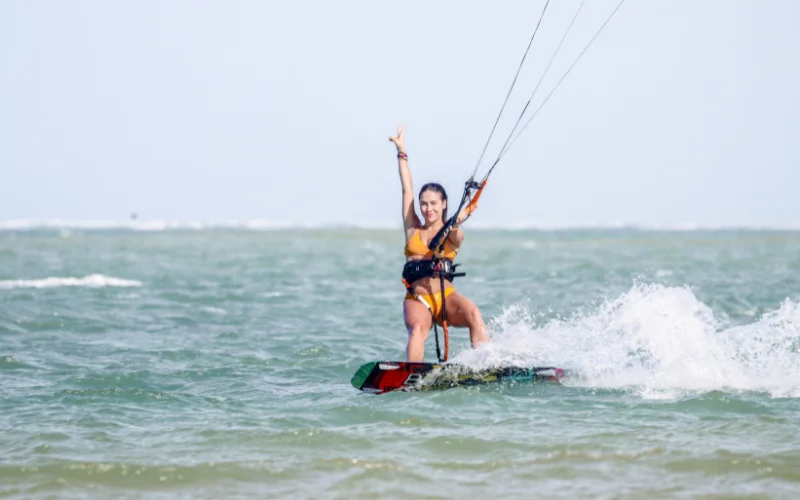 a woman in a bikini doing sea sports