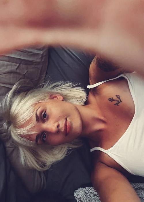 DIY boudoir self portrait with moody lighting and artistic composition