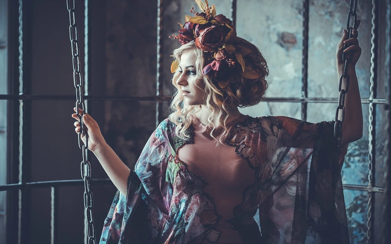Woman with bold body paint accents, a creative technique used in boudoir photography