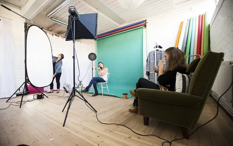 setting up of green screen for shooting