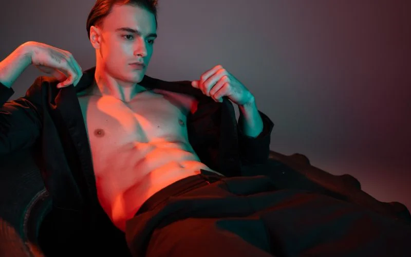 male boudoir poses with mood light