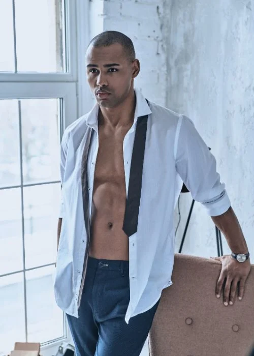Creative dudeoir photography pose highlighting masculine confidence and emotion