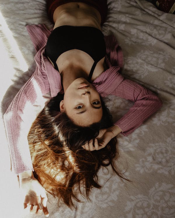 model on bed