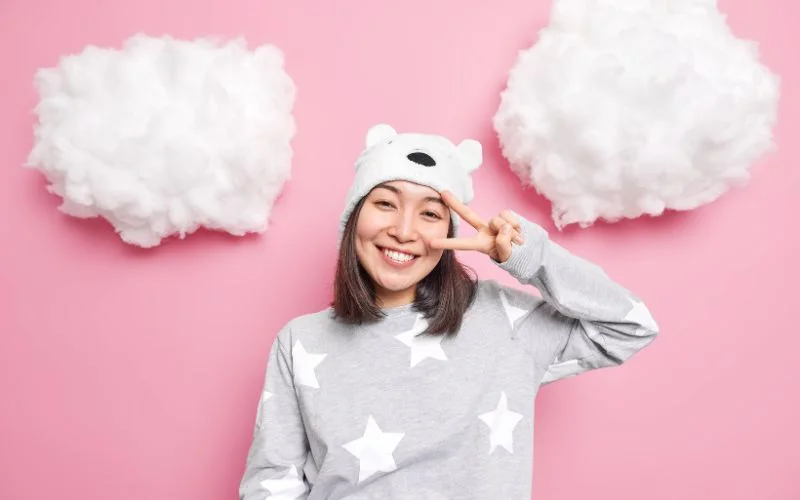 Fluffy cotton pulled apart to resemble clouds, a whimsical DIY backdrop for photos