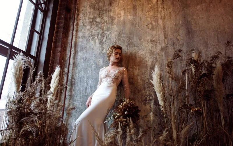 Dried flowers and botanicals arranged into a rustic, natural backdrop for photos