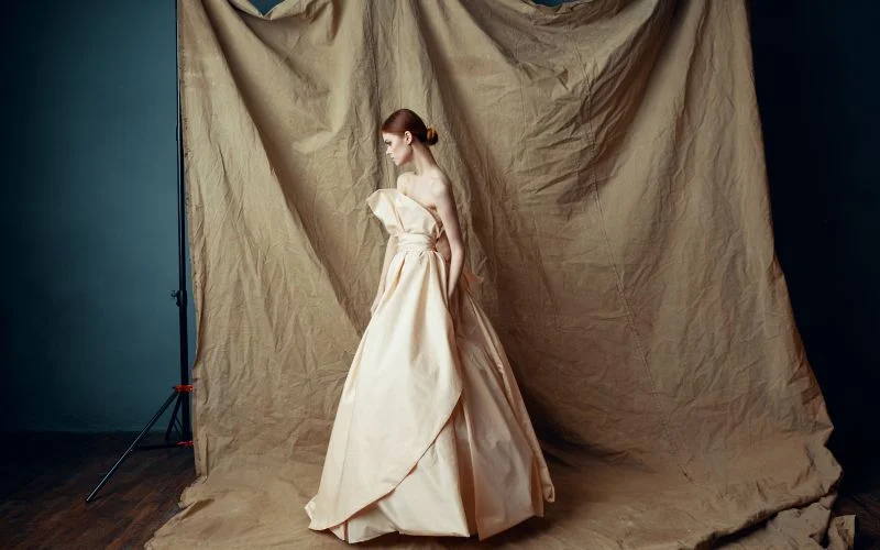 Solid colored cloth pinned up as a clean, minimalist photography backdrop