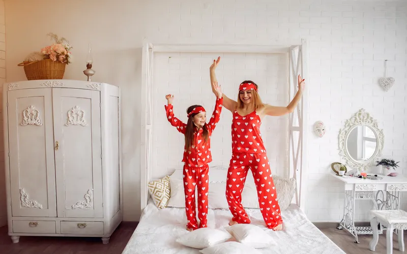 pajama party with mom and daughter in matching pajamas