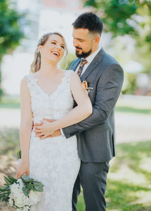 Embrace from the side wedding pose