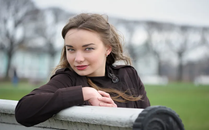 portrait of woman sitting on the bench