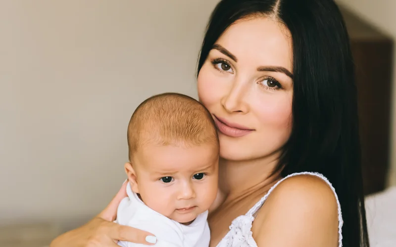 mother and baby after baptism
