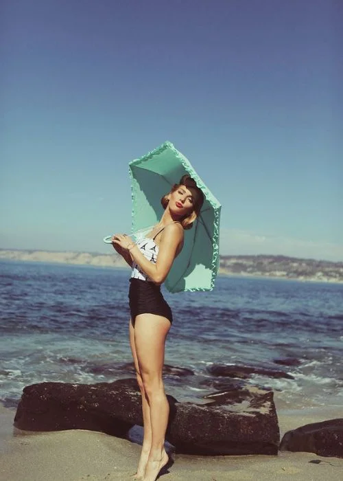 retro beach babe pose