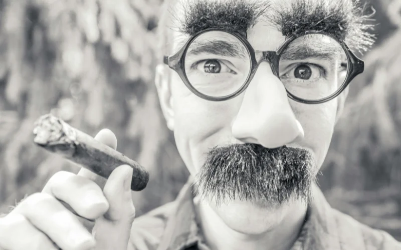 man smoking cigar