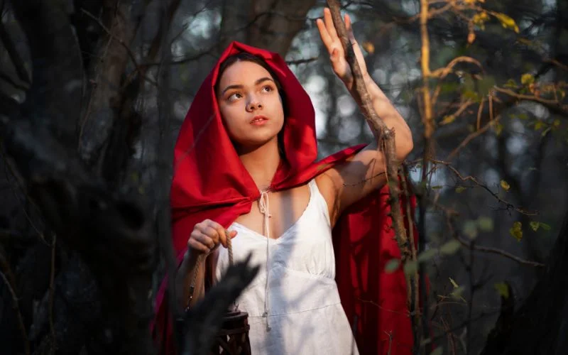 fantasy image of a girl wearing hood