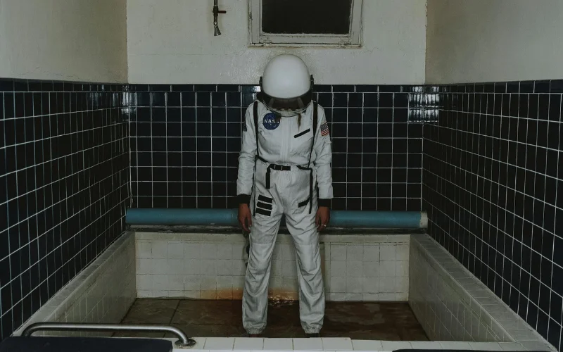 astronaut in bathroom