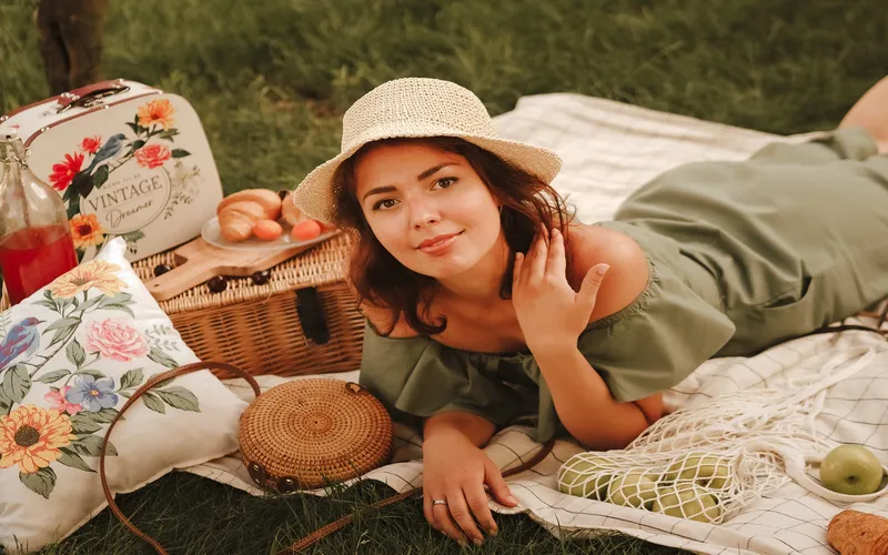 outdoor aesthetic picnic photoshoot of a woman