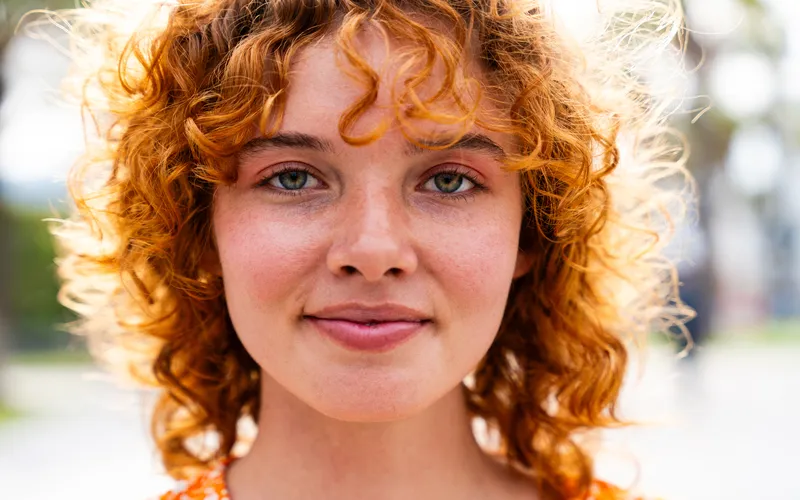close up portrait of woman with red hairs