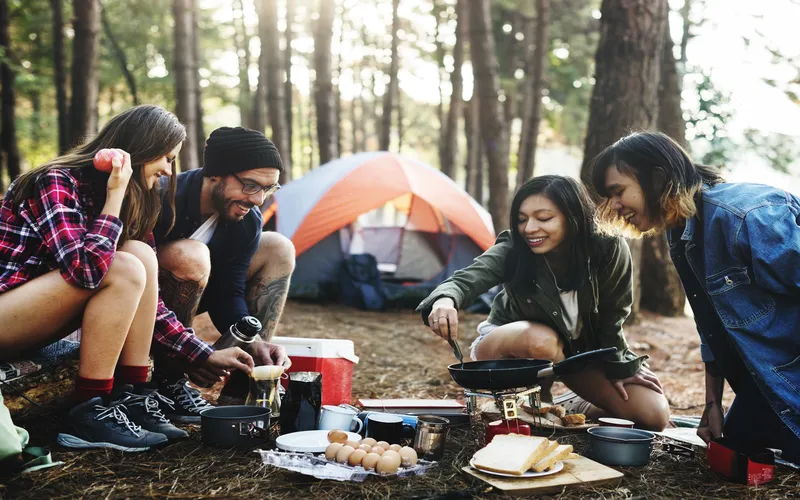 Friends enjoying camping together