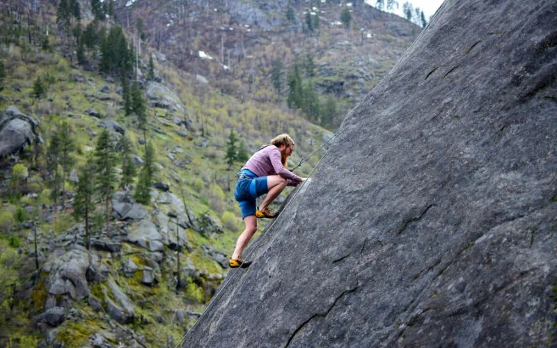 snap picture while rock climbing