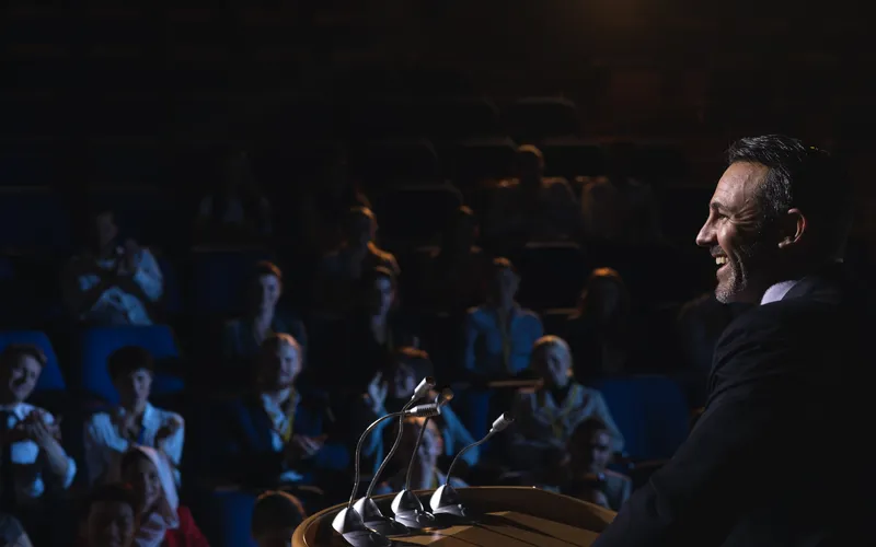 businessman giving presentation at a business convention
