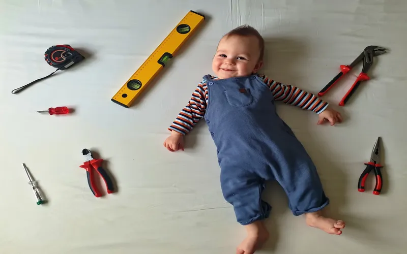 cute happy labor day photoshoot of an infant