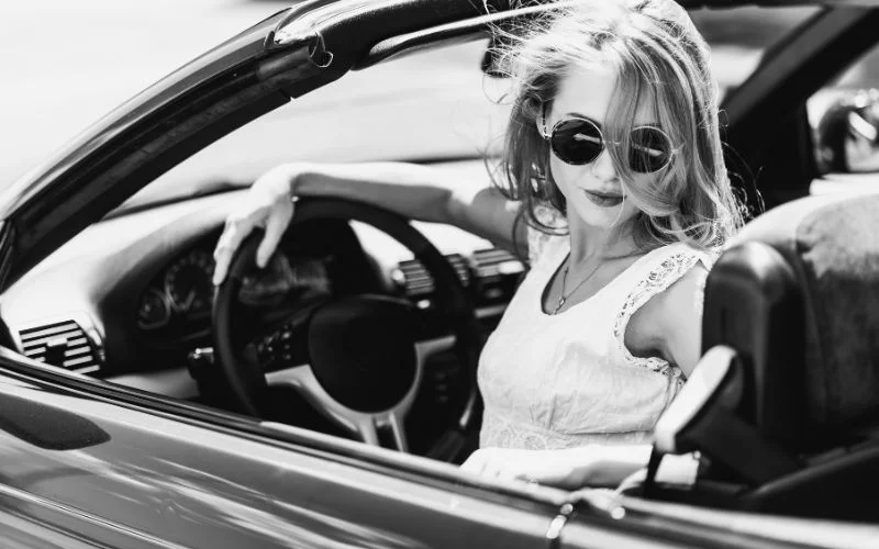 a black and white photo of a car photoshoot