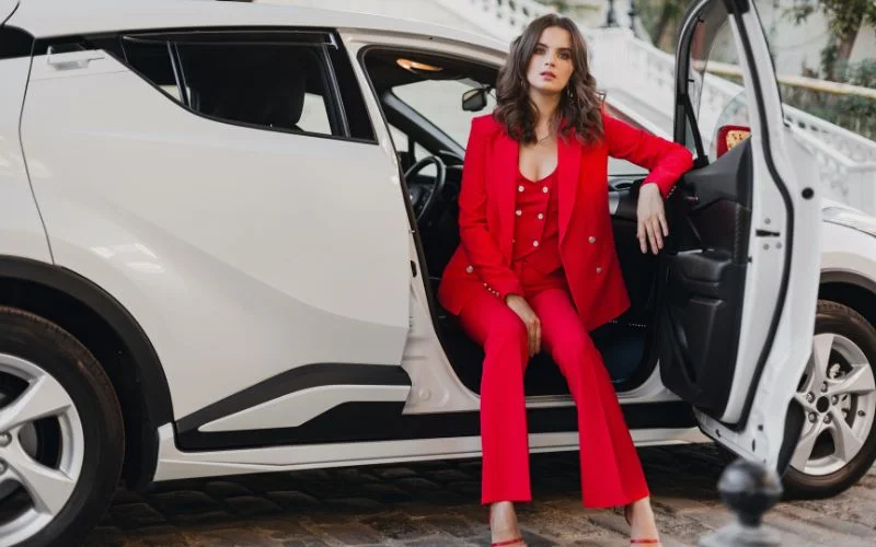 car photoshoot ideas steeping out of door