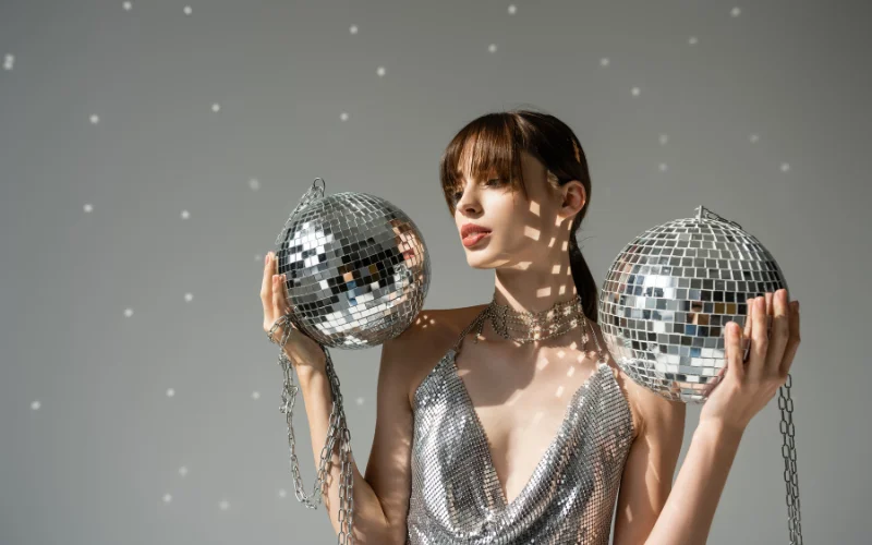 pose with disco balls
