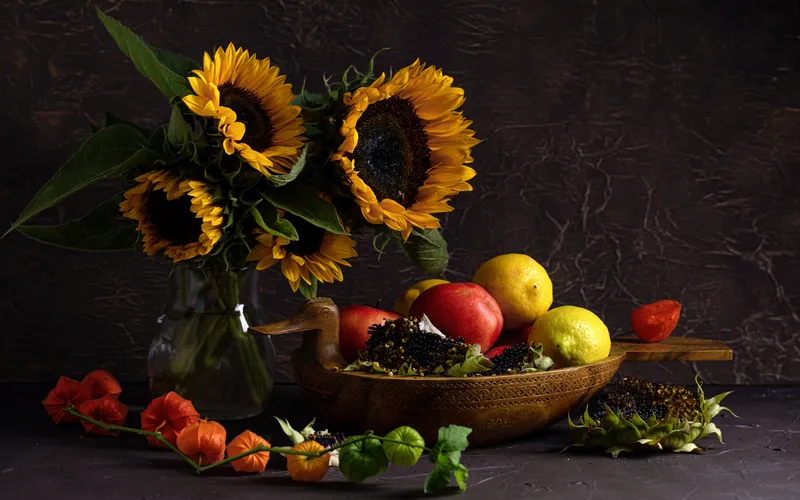 still life photo with fruits and flowers