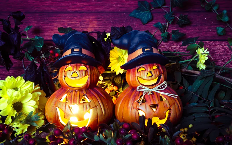pumpkins decorated with a hat