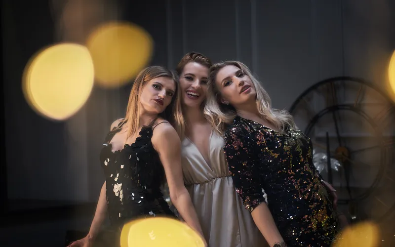 Glam photoshoot of women in different outfits