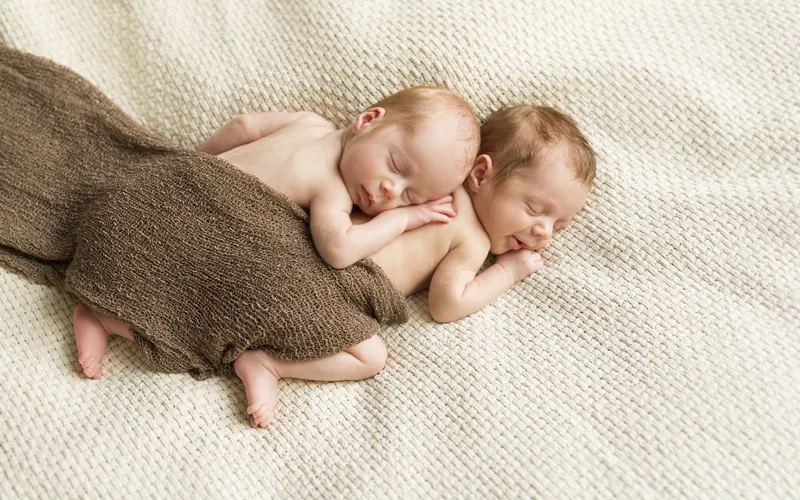 newborn twin babies sleeping