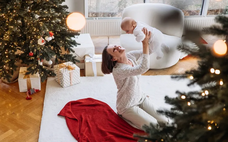 overhead shot of pregnant women playing with her child