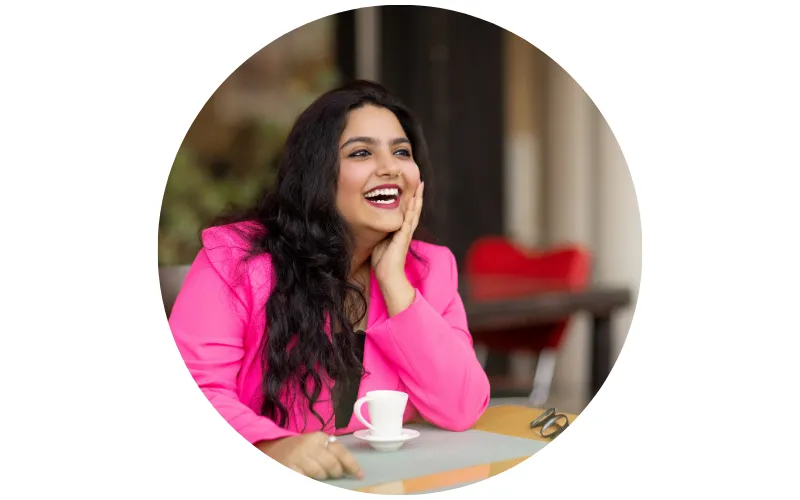 portrait of smiling young woman in cafe