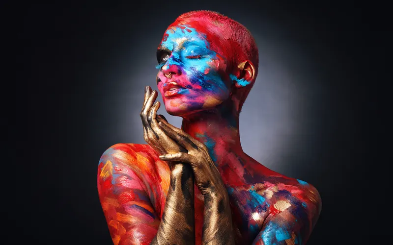 women with paint all over body