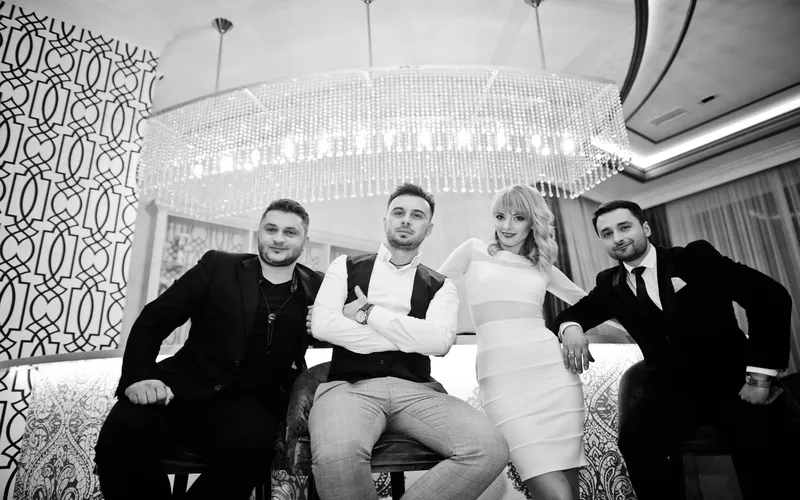 wedding shot of groomsmen and the bride