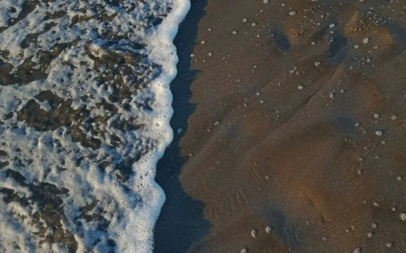 photo of foamy sea water