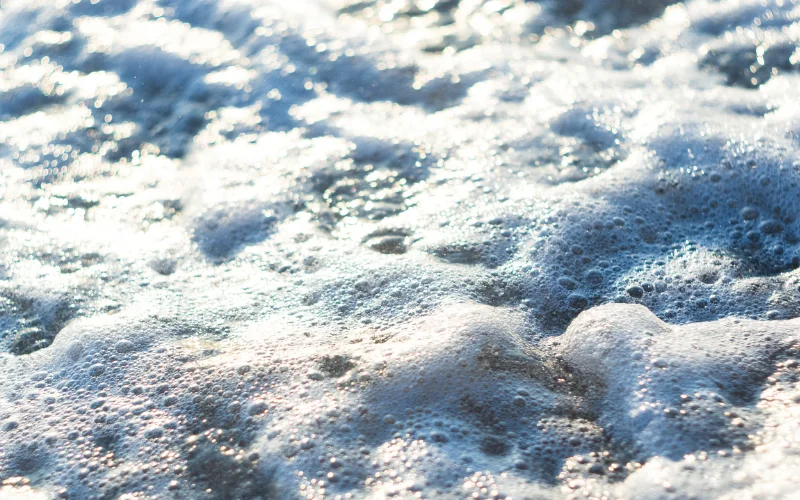 photo of foamy sea water