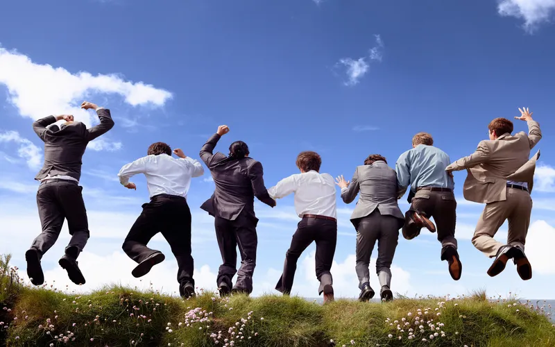 groomsmen jumping together