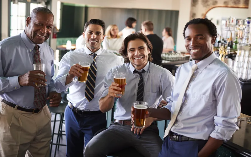 groomsmen toasting their drinks